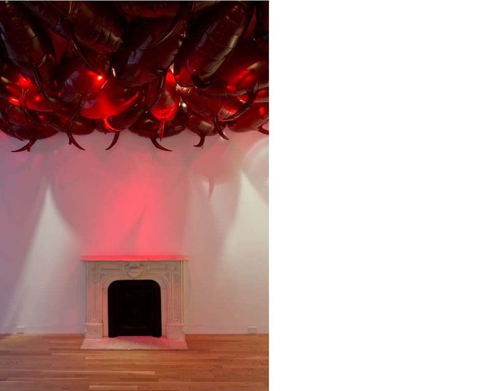 Philippe Parreno, <i>Speech Bubbles (Transparent Red)</i>, 2017. 1,500 Mylar balloons, helium and mold of balloons, 26 3/8 x 43 x 9 7/8 inches (68 x 109 x 25 cm).  © Philippe Parreno.